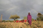 Tansania / Massai unter Regenbogen
